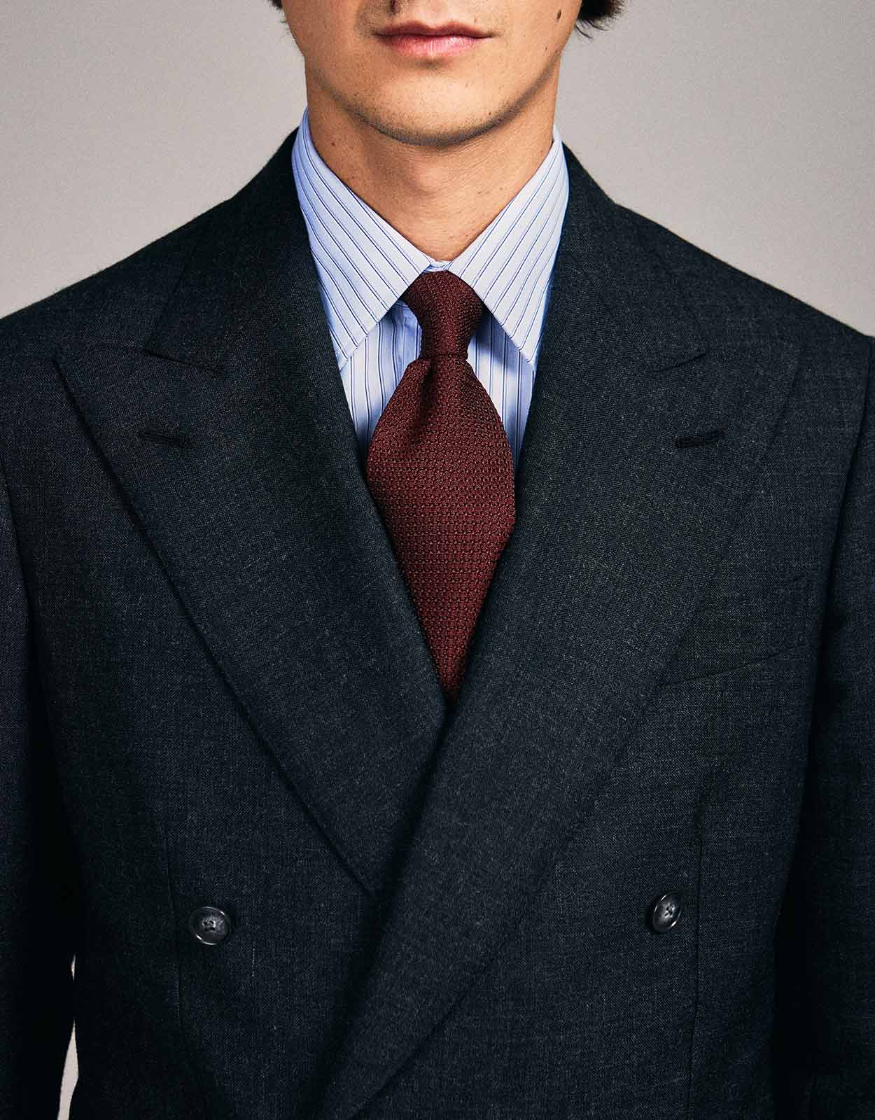 This Double-Breasted Charcoal Fresco Suit