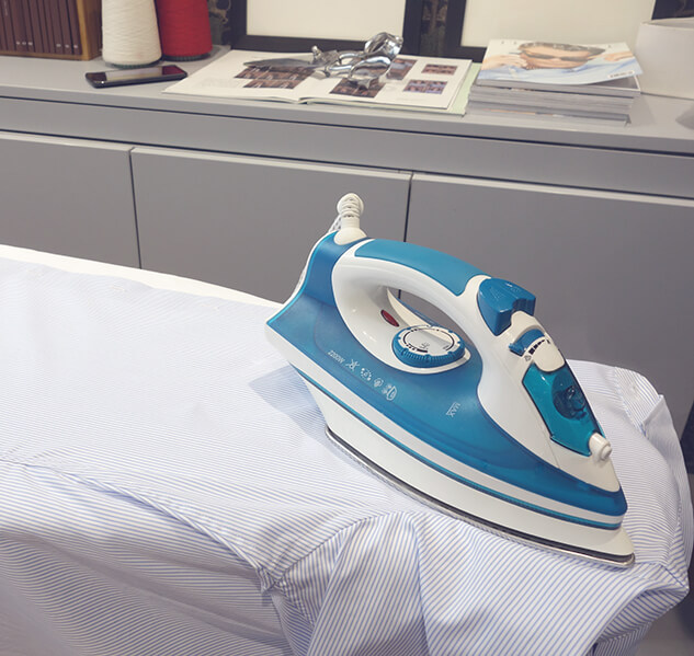 Ironing the left front of a shirt
