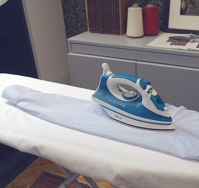 Ironing the sleeve of a shirt